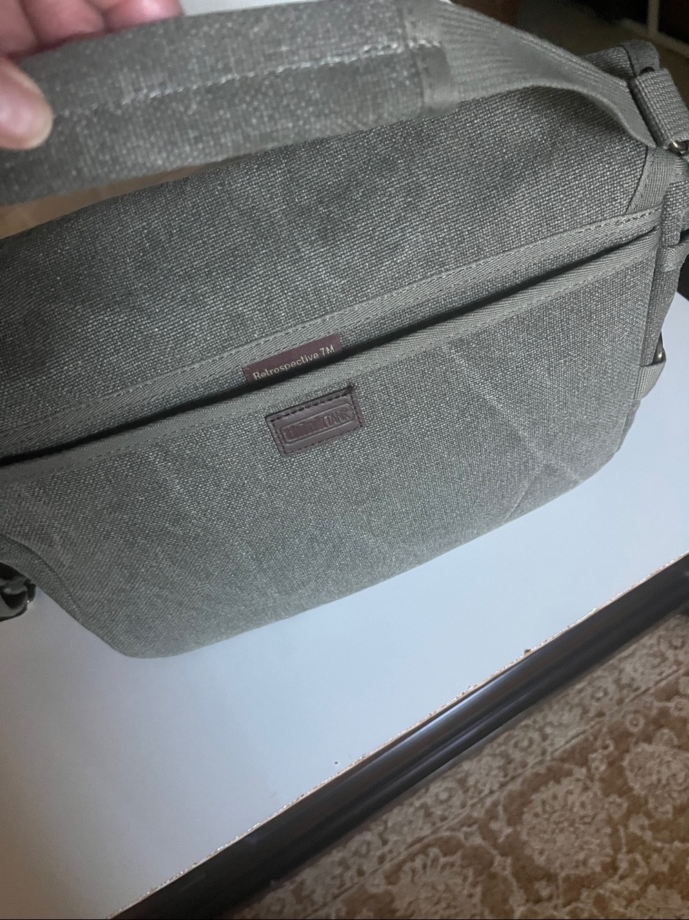Gray Canvas Think Tink Camera Bag with Adjustable Strap.